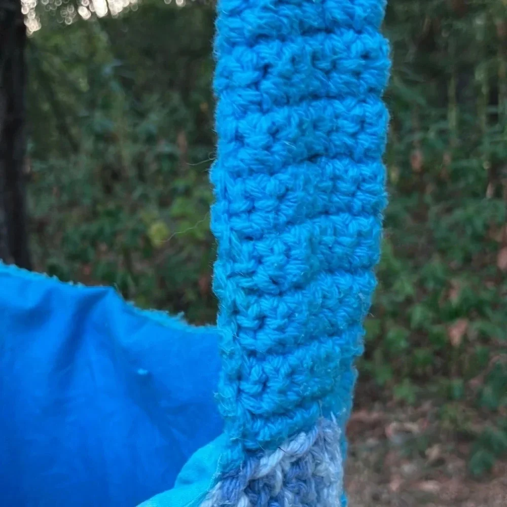 Handmade crochet bag with shell pocket and batik beautiful colors